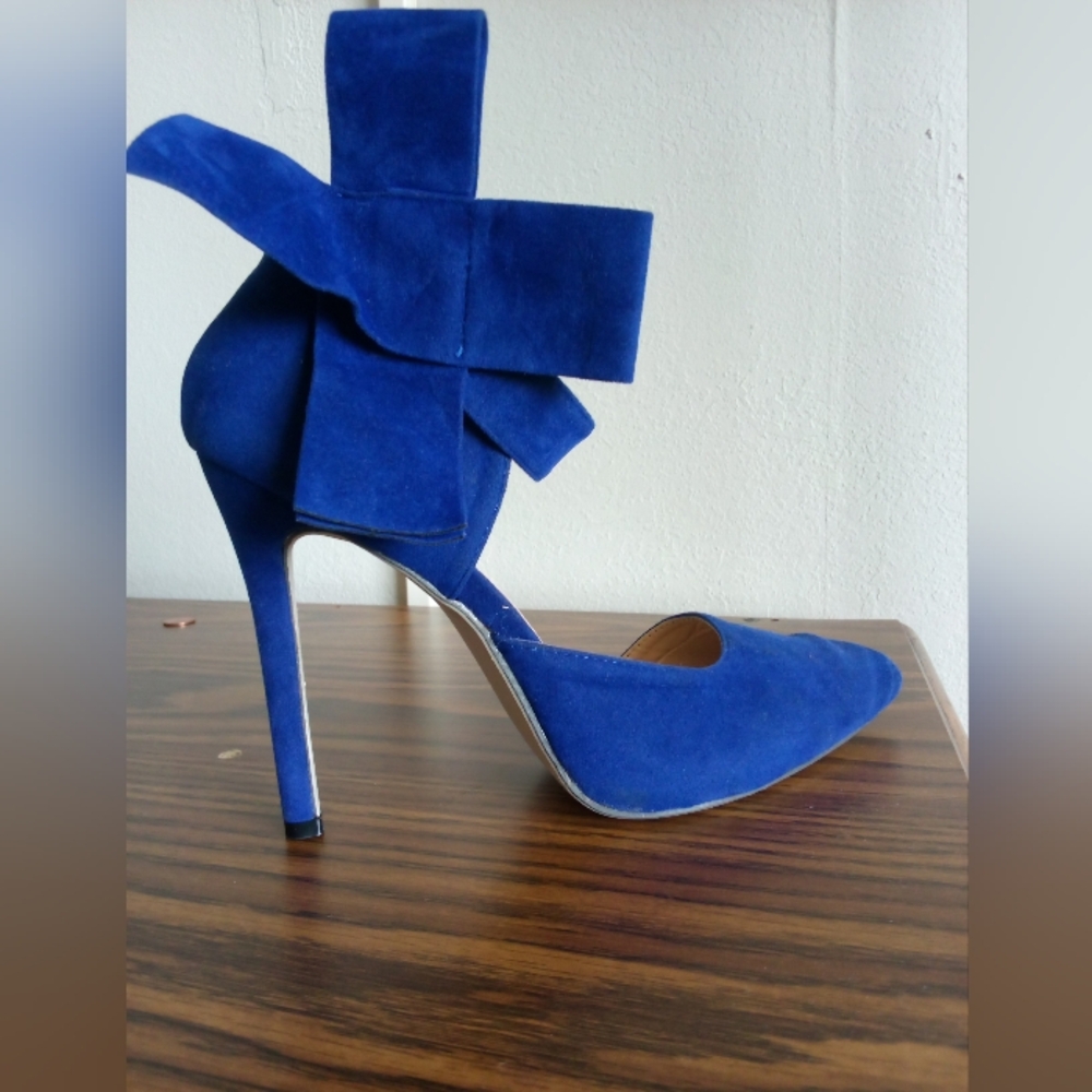 Royal blue stilettos with universal ankle Velcro bow.